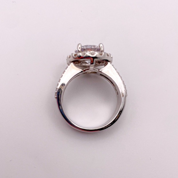 Round Cut Solitaire Halo CZ Ring with Pave and Round Cut Sides. Size 7. - Picture 7 of 9